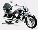The EVO-12 Bike-Pack Kit for the Hyosung GV ST7 700 (10-17) by Ventura includes a sleek black zippered bag with a logo, an adjustable sturdy black metal rack for mounting, and metal L-Brackets with screws. Text labels provide guidance for each component.
