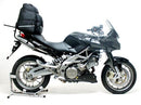 The Ventura EVO-12 Bike-Pack Kit for the Aprilia Shiver GT 750 ABS (09-11) includes a sleek black 'EVO-12 Pack,' adjustable 'EVO-Rack,' and 'L-Bracket' with screws and bolts, all against a white backdrop, making rides seamless.