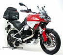 The image features the Moto Guzzi 1200 Stelvio (08-15) EVO-12 Bike-Pack Kit by Ventura, including a sleek black bike pack with an orange stripe, an Evo-Rack for motorcycles, and an L-bracket with screws, each component clearly labeled.