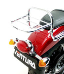 Ventura’s EVO-12 Bike-Pack Kit for Triumph Speedmaster 865 (11-15) includes a black EVO-12 pack, Evo-Rack Top-Box Rack, and an L-bracket with hardware. All items are clearly labeled for easy identification.