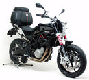 The image features the KTM Husqvarna Nuda 900 (2012) Kit with a sleek black bike pack labeled "Ventura Pack," an Evo-Rack, and a set of metal brackets with screws. Ideal for adventurers seeking organized travel solutions.