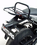 The image features the KTM Husqvarna Nuda 900 (2012) Kit with a sleek black bike pack labeled "Ventura Pack," an Evo-Rack, and a set of metal brackets with screws. Ideal for adventurers seeking organized travel solutions.