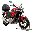 Image showing Ventura EVO-12 Bike-Pack Kit for Honda NC 700X (12-15): labeled black EVO-12 pack with Grab-Handle, Adjustable Pack-Rack mounted on the bike, and generic L-bracket with screws.