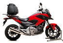 Image showing Ventura EVO-12 Bike-Pack Kit for Honda NC 700X (12-15): labeled black EVO-12 pack with Grab-Handle, Adjustable Pack-Rack mounted on the bike, and generic L-bracket with screws.