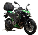 The image of the Ventura EVO-12 Bike-Pack Kit for Kawasaki Z 800 (2013) shows three parts: a sleek black EVO-12 pack with zipper, an Evo-Rack mounted on a bike, and an L-Bracket with screws, forming a versatile system enhanced by the Adjustable Pack-Rack.
