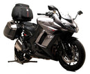 The image shows a sleek black Ventura EVO-12 Bike-Pack with logo and orange stripe. To the right, an Adjustable Pack-Rack is mounted on a Kawasaki Z 1000 SX (fits with factory panniers) (14 ->). Below, an L-Bracket with screws is labeled "Generic Image.