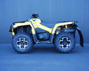 A Ventura Can-Am ATV Outlander G2 800R, XT, XTP (12-18) in yellow with black details and sturdy bull-bars is parked on dark pavement against a plain dark wall.