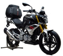 Image of the Ventura EVO-12 Bike-Pack Kit with a sleek black EVO-12 pack. Features an adjustable Pack-Rack and L-Bracket with screws, plus an EVO-Rack attached to a BMW G 310 R bike in a generic image.
