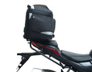 Ventura Bike-Pack Kit for Suzuki GSX-R 1000 (17 - >), with black EVO-12 pack, metal Adjustable Pack-Rack pannier support mounted on bike, and L-Bracket with screws, all items clearly labeled.