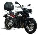 The Ventura EVO-12 Bike-Pack Kit for Triumph Street Triple 765S, S(LAMS), R, RS (17 >) shows three labeled components: a black EVO-12 bag, an Evo-Rack on a bike, and a generic L-bracket with screws.