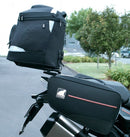 The image showcases Ventura's EVO-12 Bike-Pack Kit, featuring a sleek black pack labeled "EVO-12 Pack," an "EVO-Rack" metal rack, and an "L-Bracket" set with screws, all compatible with the KTM 1290 Super Adventure S (17-18) for personalized storage solutions.