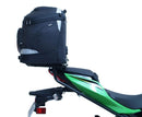 The image showcases a Ventura EVO-12 Bike-Pack Kit for the Kawasaki Ninja 400 (18 - >), featuring an adjustable Pack-Rack system. It includes an EVO-12 pack, EVO-RACK, and L-bracket with screws. Each part is labeled, and the L-bracket uses a generic image.