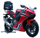 The image displays Ventura's EVO-12 Bike-Pack Kit, including a black pack with an orange stripe, the Evo-Rack for Honda CBR 1000 RR Fireblade (17-19), and a durable L-Bracket with screws. Each part is labeled in red text on a white background.