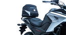 The image displays the components of Ventura's EVO-12 Bike-Pack Kit, including a sleek black EVO-12 pack, an Evo-Rack mounted on a Honda NC 750 X (17-20), and an L-Bracket with screws, each element clearly labeled.