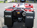 A Ventura-branded Suzuki ATV LT-A 500 AXI is parked, featuring red with black side storage flaps and "Ventura Motorcycle Accessories" text. It includes a rear cargo rack, visible engine components under the seat and sturdy bull-bars for extra protection.