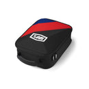 The 100% Cornerstone Goggle Case is black with a zippered closure, handle, and the "100%" logo on the lid. Angled red and blue stripes decorate the top, making it stand out against a white background.