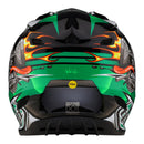 The Troy Lee Designs SE4 POLYACRYLITE HELMET W/MIPS CARB GREEN features bold graphics, a cartoon engine with flames, checkered flag pattern, “Troy Lee Designs” on the visor, and MIPS technology for enhanced safety.