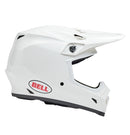 The Bell MX-9 MIPS White full-face helmet features a polycarbonate shell, visor peak, and the Velocity Flow ventilation system for comfort. The BELL logo in red and black adorns the side.