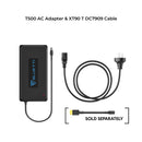 Here is an image of the BLUETTI T500 AC Adapter for AC200MAX, B230, and EP500. The adapter boasts a rectangular black body with a textured surface, prominently displaying the BLUETTI logo. It comes equipped with a black power cord featuring a barrel connector and an AC power cord with a plug, making it ideal for powering your BLUETTI power station. The text "T500 AC Adapter" is displayed above.