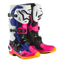 Introducing ALPINESTARS' Tech-10 MX Boots Coast LE with a striking design: one boot is blue with white and black accents, the other is pink with black and white. Both feature orange soles, dynamic heel compression protectors, distinctive buckles, and protective elements.