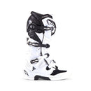 The ALPINESTARS Tech-7 MX Boots in white/black offer adjustable straps and protective features, designed for motocross or off-road use. They feature a sleek, sturdy design, impact resistance, and prominent branding on the top section.