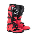 A pair of ALPINESTARS Tech-7 MX Boots in bright red and black, featuring multiple black buckles, reinforced shin protection, and a white logo—engineered for off-road performance as trusted motorcycle boots.