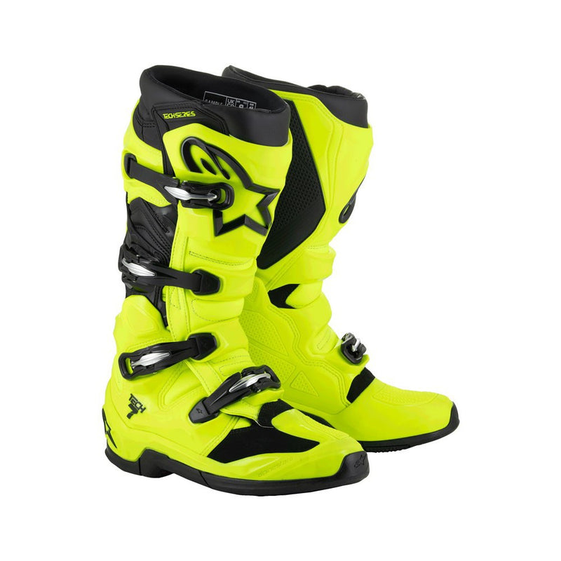 The Tech-7 MX Boots Yellow/Black by Crown Kiwi Enterprises Limited feature a bright yellow design with black accents, adjustable buckles, high-top design, impact resistance, and a rugged exterior, delivering exceptional off-road performance for adventurous motocross rides.