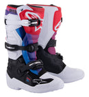 A vibrant pair of Tech-7S MX Boots from Crown Kiwi Enterprises Limited showcases striking panels in red, blue, purple, black, and white. Engineered for durability and protection, these boots feature rugged plastic buckles and are adorned with logos and text along the sides.