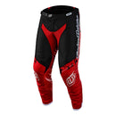 The Troy Lee Designs YOUTH GP PANT ASTRO RED / BLACK features articulated knee technology, white logo graphics, side text, a zippered fly, adjustable waist, and flexible panels for comfort and mobility—essential motocross riding gear.
