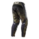 The Troy Lee Designs GP Pant Brazen Camo Army Green features black and green camo, reinforced black panels, breathable fabric, white branding on the left leg, and logo details on both knees.