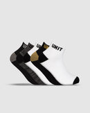 Displayed against a plain background are four pairs of ankle socks from the Unit brand's Vital Bamboo Lo Lux collection. These socks, made from bamboo fiber, feature stylish designs in black and gray, gray, black and gold, as well as plain black and white. They provide comfort through thermo-regulating and anti-bacterial properties.