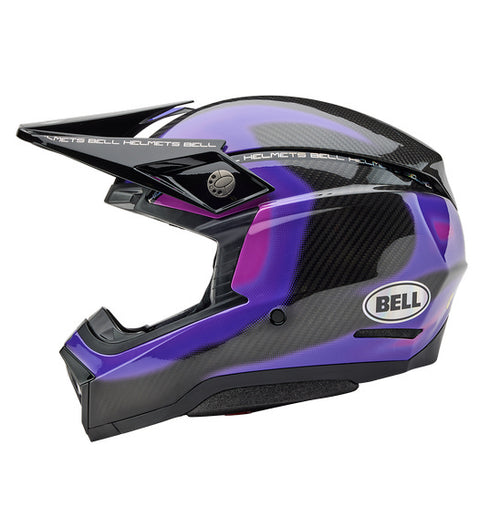 The Bell MOTO-10 SPHERICAL Flare Gloss Purple is a sleek, full-face motocross helmet with a dynamic design in shades of purple and black. It is enhanced by MIPS Spherical Technology for superior safety, features a visor, and proudly displays the "Bell" brand logo on the side. Carbon fiber detailing adds the finishing touch to its style.