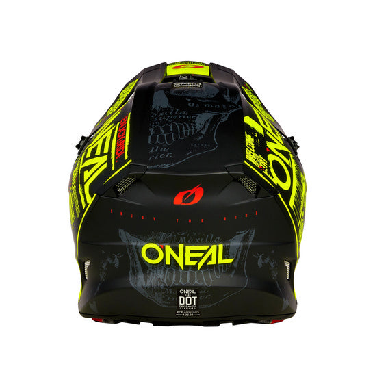 A top view of the O'Neal 5SRS ATTACK Helmet - Black/Neon showcases its striking graphic designs in neon yellow and white. The ABS shell construction ensures durability, with the ONEAL logo prominently displayed on the sides and top. Various branding and text, including a bold skull graphic, are imprinted around its surface.