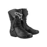 Introducing the Stella SMX-6 v3 by Crown Kiwi Enterprises Limited, a pair of black motorcycle boots meticulously designed for track performance. These stylish boots feature protective materials and anatomical contours for enhanced safety. They proudly display logo detailing on the upper section, textured soles, and include ventilation panels to ensure comfort and durability.
