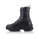 A pair of Ava Women's Boots by Crown Kiwi Enterprises Limited, crafted in black leather with thick, rugged soles and lace-up fronts. These protective boots for women feature a convenient pull-tab at the back, designed for outdoor or heavy-duty use. They stand side by side, prepared to tackle urban adventures.