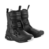 Introducing the Stella RT-7 Drystar Boots by Crown Kiwi Enterprises Limited: these black motorcycle boots deliver protective adventure touring features ideal for dedicated touring riders. Equipped with Velcro straps, reinforced soles, and a sleek design accented with white on the toe cap, they seamlessly blend style and safety.