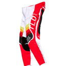 The Troy Lee Designs SE Ultra Pant Reverb Red/White motocross pants feature red, white, yellow, and black graphics, "TLD" on the side, and durable leather knee panels for extra protection.