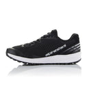 A pair of black athletic shoes, the Meta Road v2 Shoes from Crown Kiwi Enterprises Limited, featuring white soles and "alpinestars" printed on the side. These lightweight shoes boast a sleek design with a star logo, offering a breathable fit and textured sole for enhanced grip.