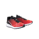 Introducing the ALPINESTARS Meta Road v2 Shoes: red and black athletic shoes with a white sole. These durable, lightweight shoes feature branding on the side, a logo, and breathable mesh for comfort. With black laces and textured tread, they provide excellent grip for all activities.