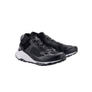 Introducing the Meta XR v2 Shoes by Crown Kiwi Enterprises Limited: sleek black athletic trail running shoes featuring high ankle support and thick, rugged soles for superior grip. These shoes have a lace-up design with contrasting white accents, making them ideal for off-road running.