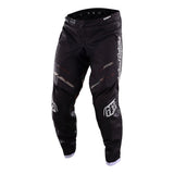 The Troy Lee Designs GP PRO Pant Blends Camo Black / Green motocross pants feature a durable 600D polyester build, reinforced knees, and secure TLD zipper. Athletic fit with bold camo design is displayed upright on a white background.