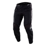 Troy Lee Designs GP PRO PANT MONO BLACK: black pants with a white logo on the right thigh, crafted from tough 600D polyester with reinforced knees, stretch panels, and a fitted design.