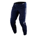 The Troy Lee Designs GP PRO PANT MONO NAVY motocross pants, made from durable 600D polyester, feature white logos on the left thigh and right knee and are shown standing upright on a white background.