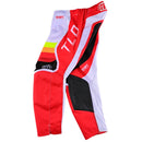 The Troy Lee Designs YOUTH GP PRO PANT REVERB RED / WHITE features durable 600D polyester in red, white, and black with neon yellow and orange stripes, TLD lettering, and branded patches, shown on a white background.