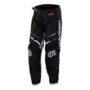 The Troy Lee Designs YOUTH GP PRO PANT BLENDS CAMO BLACK / WHITE features white and gray stretch panels, a waist belt, and "DICE DIVINE" logo on the right leg. Made from durable 600D polyester, shown upright on a white background.