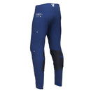 The THOR PANTS SPORT STRIKE NAVY, designed by THOR MX, feature a sleek navy design with white and black accents that ensure unrestricted mobility. The brand name "THOR" is prominently displayed on the right thigh in white letters. Crafted for athletic performance, these pants incorporate reinforced knee areas and a secure white buckle at the waist.