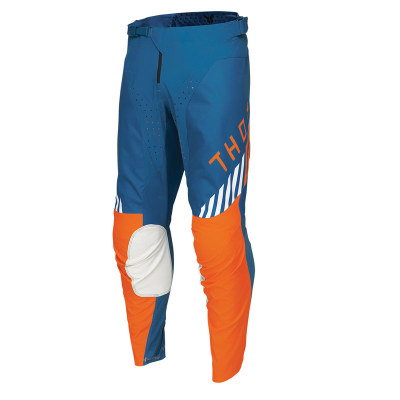 The THOR PANTS LAUNCH ZONE BLUE by THOR MX offer precision-fit comfort with their blue and orange poly stretch fabric, accented by white details. These motocross pants feature reinforced knee areas and ventilation for improved performance, incorporating a white wing-like logo and a white stripe pattern on the sides, exemplifying the LAUNCHMODE excellence.