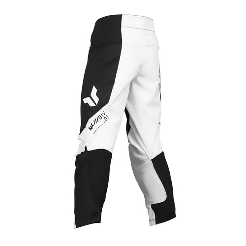 THOR MX presents the Launch Youth Storm Black pants, designed for motocross enthusiasts. These black and white pants feature "THOR" written vertically on the upper left thigh and are part of the esteemed Launch collection. They boast reinforced knee areas, durable full-grain leather accents, and a secure adjustable waistband, making them ideal for off-road biking and racing.