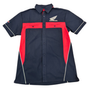 The HRC Honda HRC Pit Crew Shirt is a short-sleeved, button-up shirt featuring a stylish navy blue and red color scheme. It includes the Honda logo in white on the left chest area, two front pockets with red flaps, and a small flag patch on the right sleeve, offering a blend of performance and casual comfort for true fans.