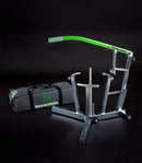A silver Rabaconda 3 Minute Mousse/Dirt Bike Tire Changer with a neon green handle is shown against a dark backdrop, featuring a sturdy metal base and multiple support rods, alongside a black "Rabaconda" bag.